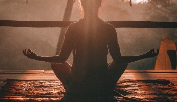 An in-depth review of the benefits of yoga and meditation.