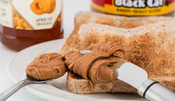 An in-depth guide on the safety of peanut butter and dogs.